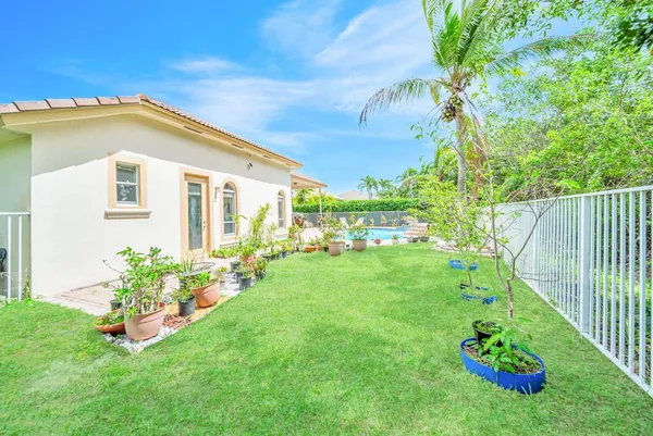 $999,900 | 6169 Northwest 53rd Circle, Coral Springs, FL 33067