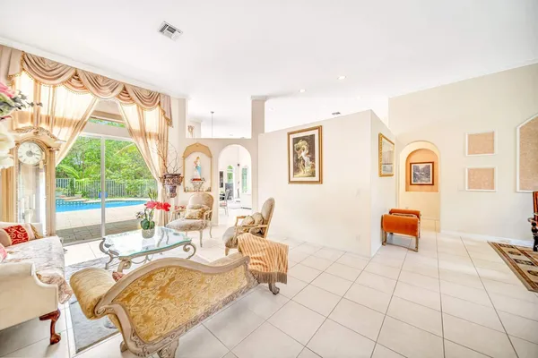 $999,900 | 6169 Northwest 53rd Circle, Coral Springs, FL 33067
