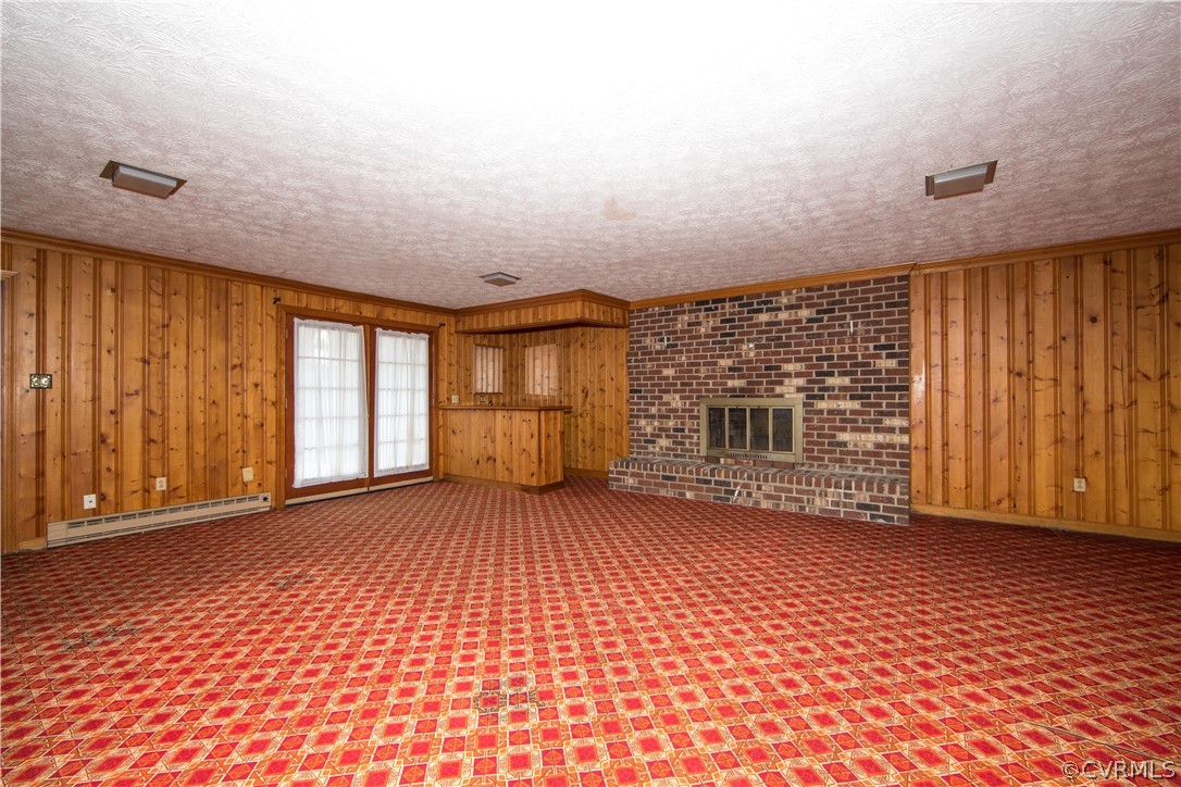 11271 Celtic Road Chesterfield, VA 23838 - Photo 24 of 26 a view of an empty room with a fireplace and a window