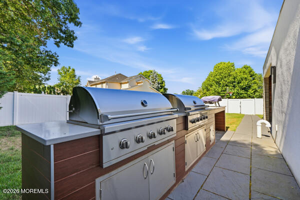 54 Georgetown Road Eatontown, NJ 07724 - Photo 24 of 24 a view of an outdoor kitchen