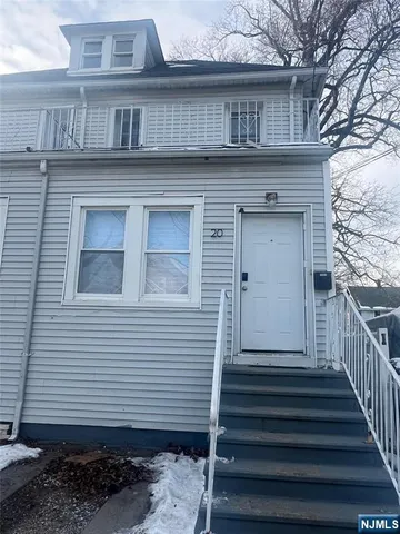 a front view of a house with a door