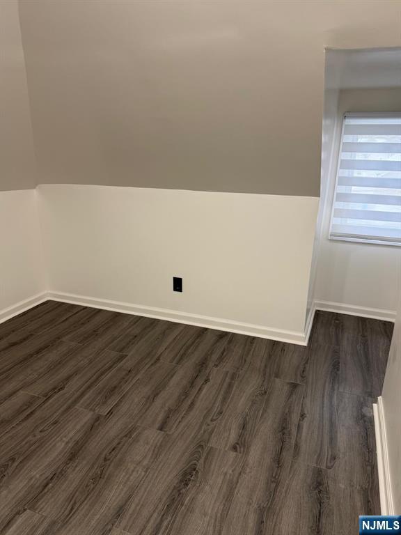 20 Maple Street Ridgefield Park, NJ 07660 - Photo 9 of 22 an empty room with wooden floor and windows