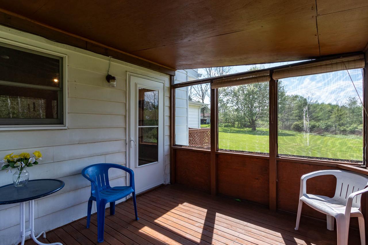 203 Gorton Road Moshannon, PA 16859 - Photo 33 of 39 a room with furniture and a window