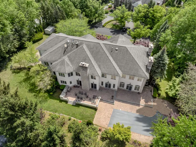 an aerial view of a house with a garden