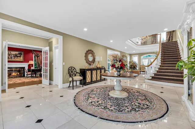 a view of a living room and dining room