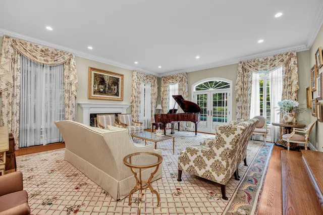 a living room with furniture and a table