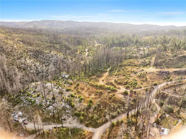 a view of a city with mountains in the background