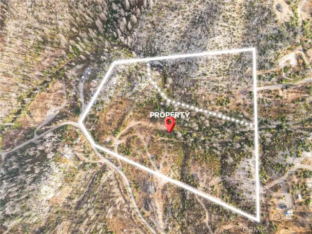 a view of a backyard of the house