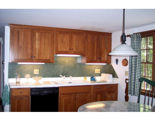 223 Middle Road Newbury, MA 01922 - Photo 4 of 10 a kitchen with a sink cabinets and window
