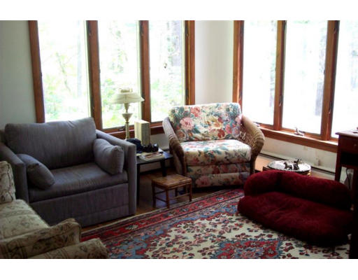 223 Middle Road Newbury, MA 01922 - Photo 6 of 10 a living room with furniture and a large window