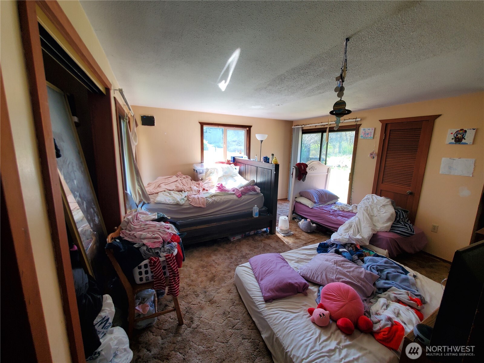 4924 165th Lane Southwest Rochester, WA 98579 - Photo 14 of 27 a bedroom with bed or couch and a window