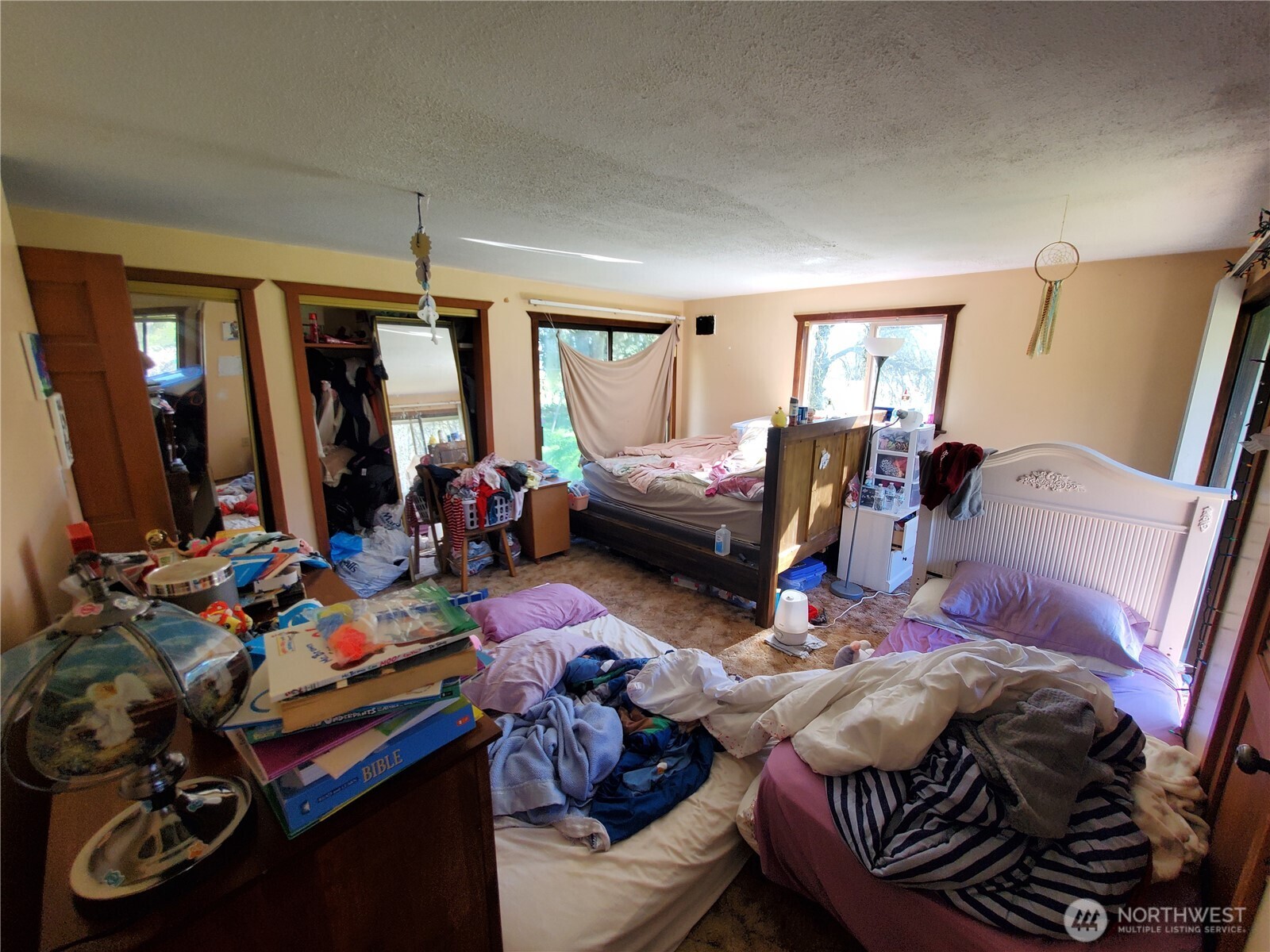 4924 165th Lane Southwest Rochester, WA 98579 - Photo 15 of 27 a bed room with furniture and a window