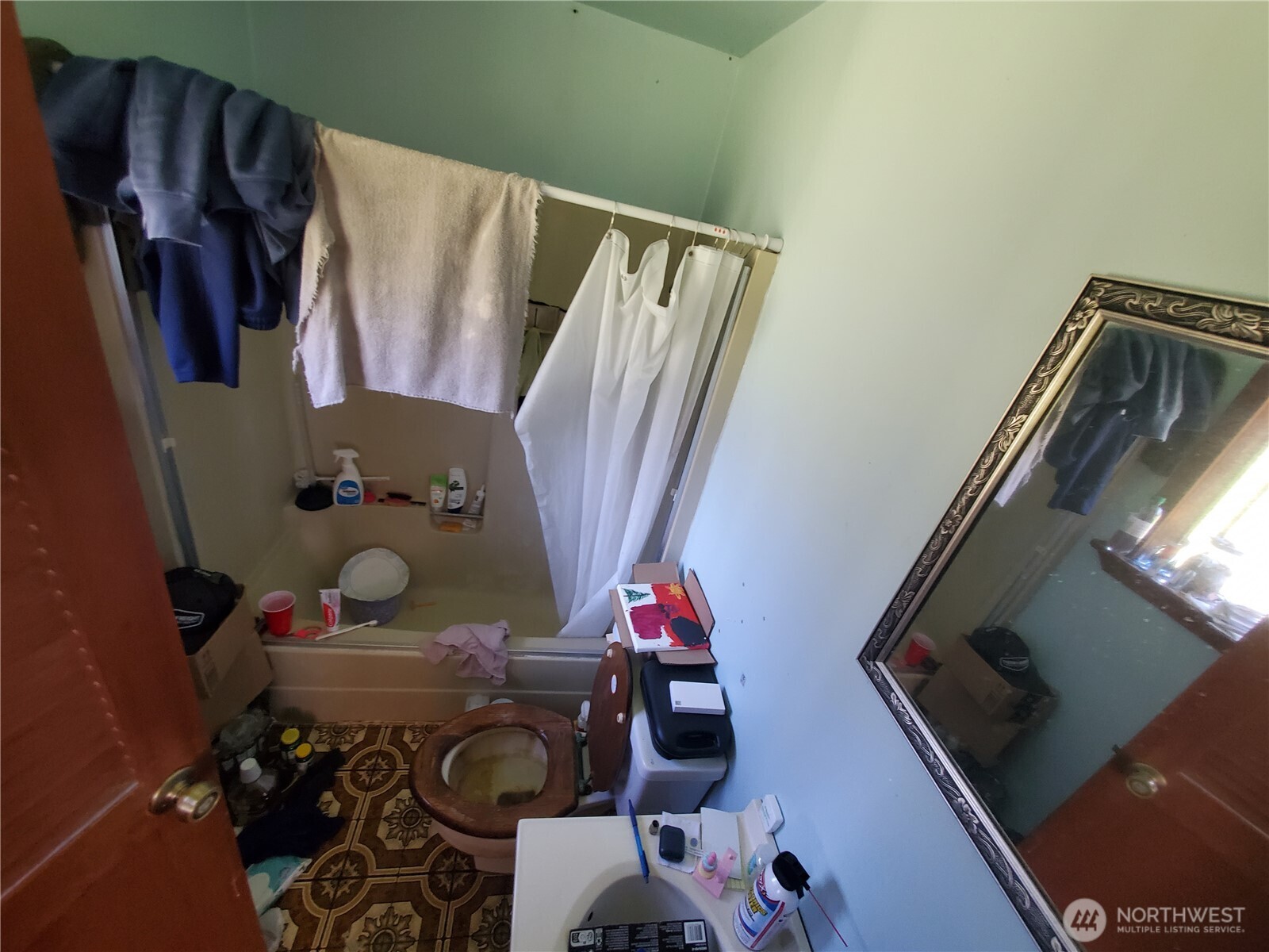 4924 165th Lane Southwest Rochester, WA 98579 - Photo 17 of 27 a view of walk in closet with clothes and shoes