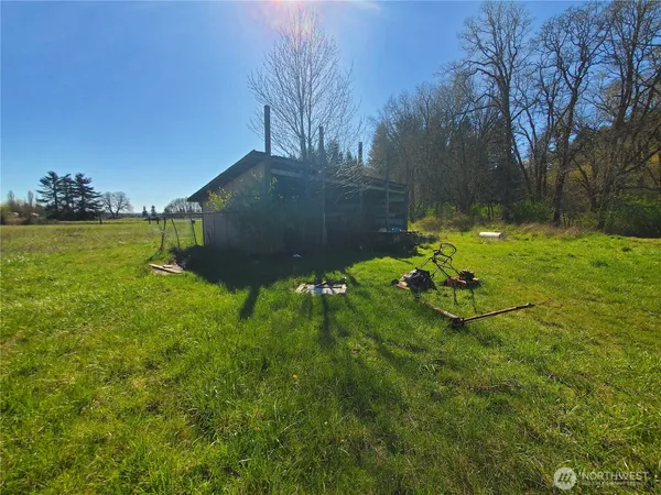 a backyard of a house with lots of green space