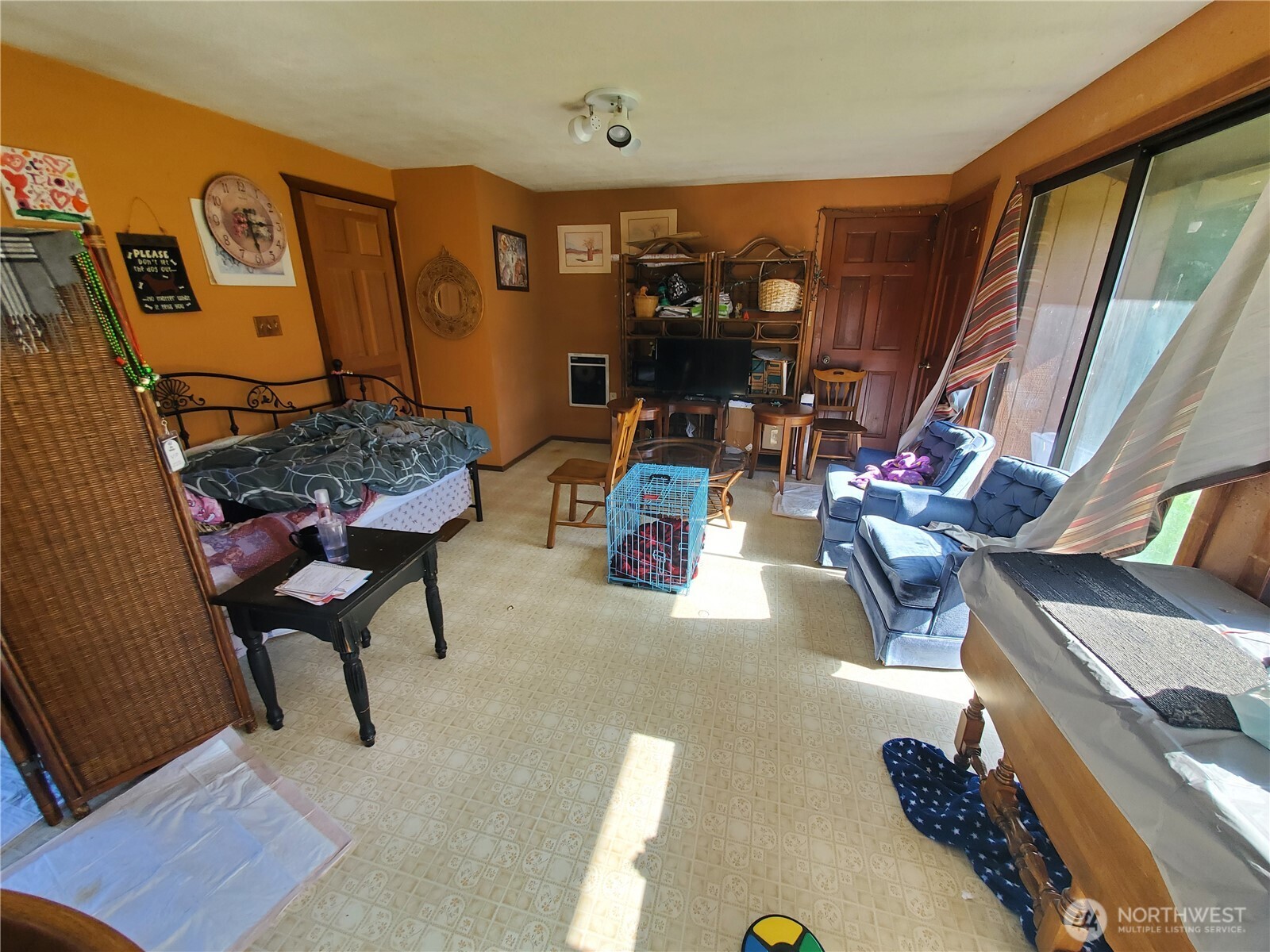 4924 165th Lane Southwest Rochester, WA 98579 - Photo 5 of 27 a living room with furniture and a flat screen tv