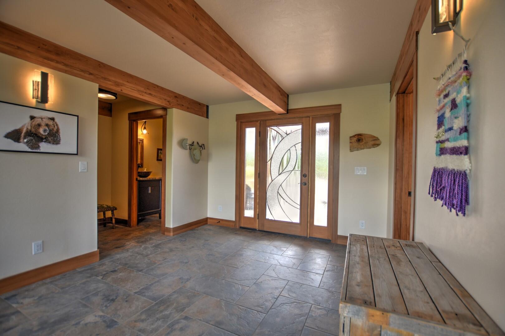 10 Valley View Road Ridgway, CO 81432 - Photo 11 of 33 a view of a hallway with wooden floor and windows