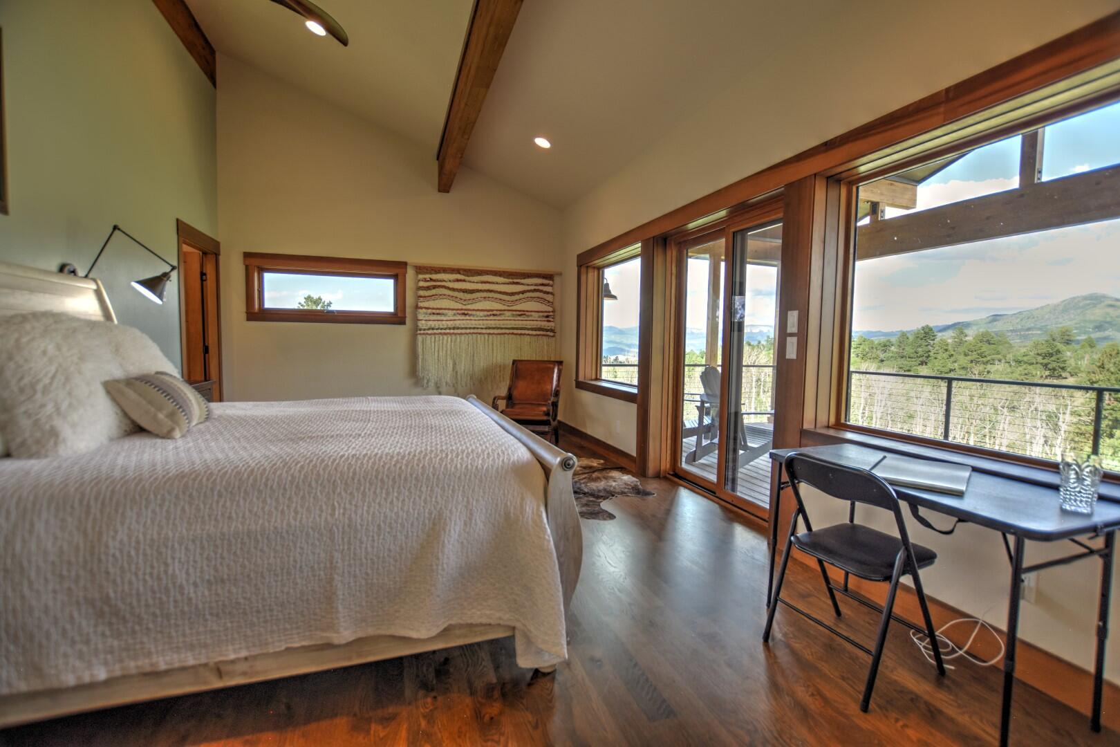 10 Valley View Road Ridgway, CO 81432 - Photo 12 of 33 a bedroom with a bed and a large window