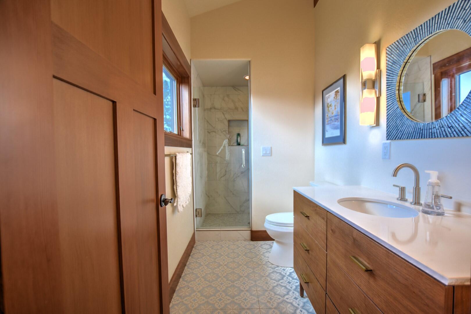 10 Valley View Road Ridgway, CO 81432 - Photo 17 of 33 a bathroom with a double vanity sink and a mirror