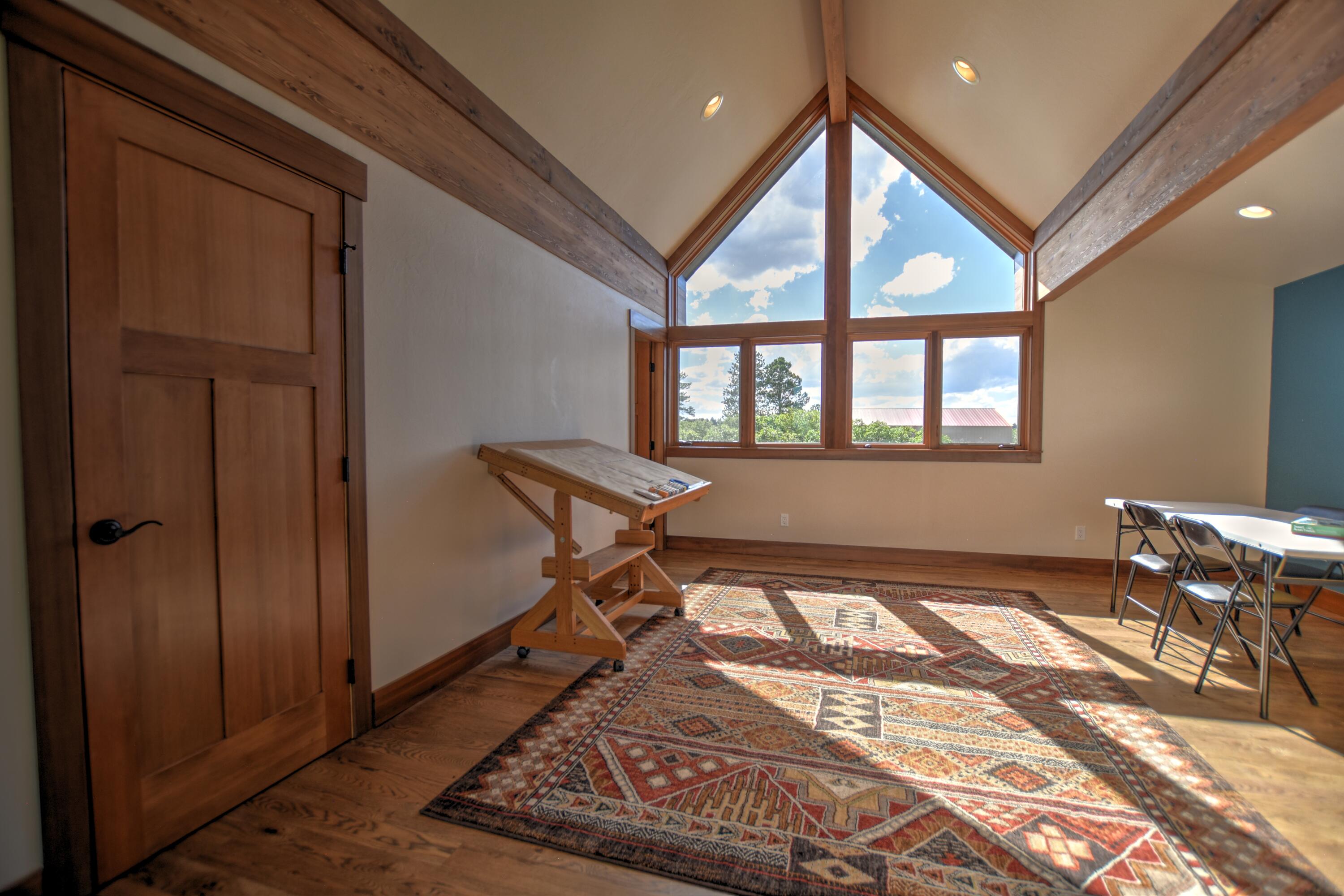 10 Valley View Road Ridgway, CO 81432 - Photo 19 of 33 a living room with a couch and a table