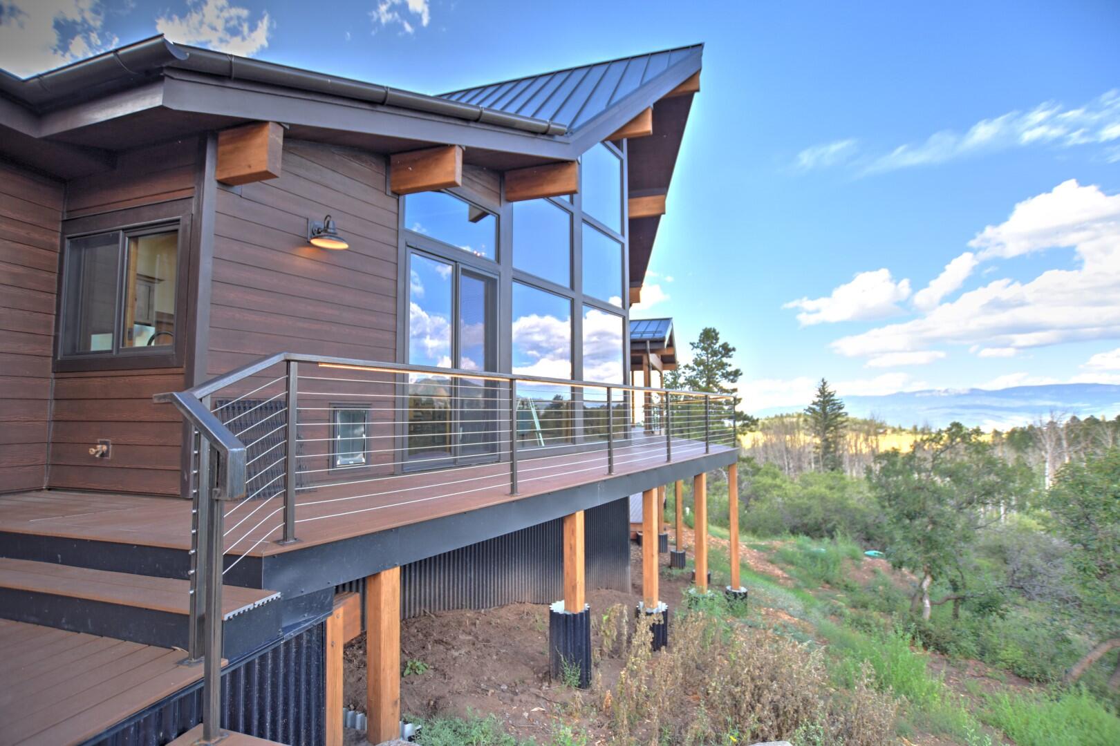 10 Valley View Road Ridgway, CO 81432 - Photo 2 of 33 a view of balcony with two chairs and wooden fence