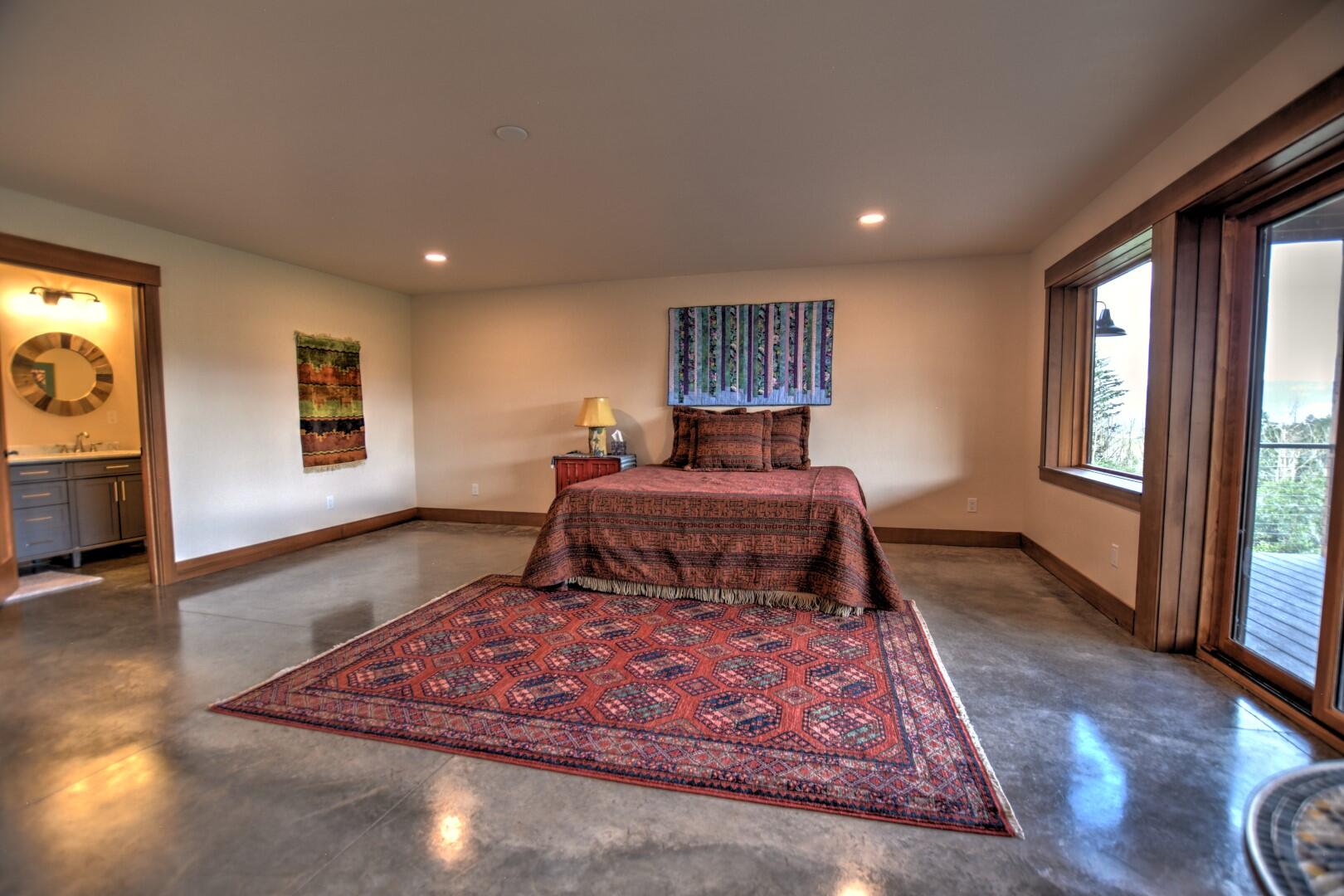 10 Valley View Road Ridgway, CO 81432 - Photo 22 of 33 a bedroom with a large bed and a window