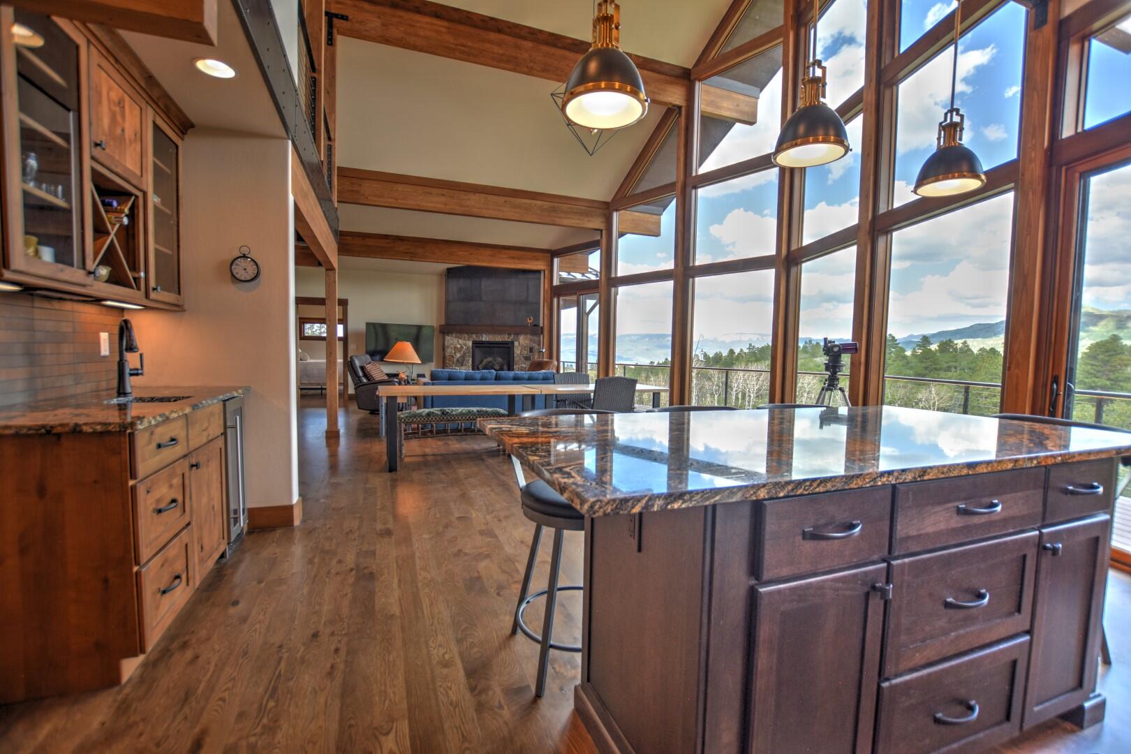 10 Valley View Road Ridgway, CO 81432 - Photo 8 of 33 a kitchen with stainless steel appliances granite countertop a stove and cabinets
