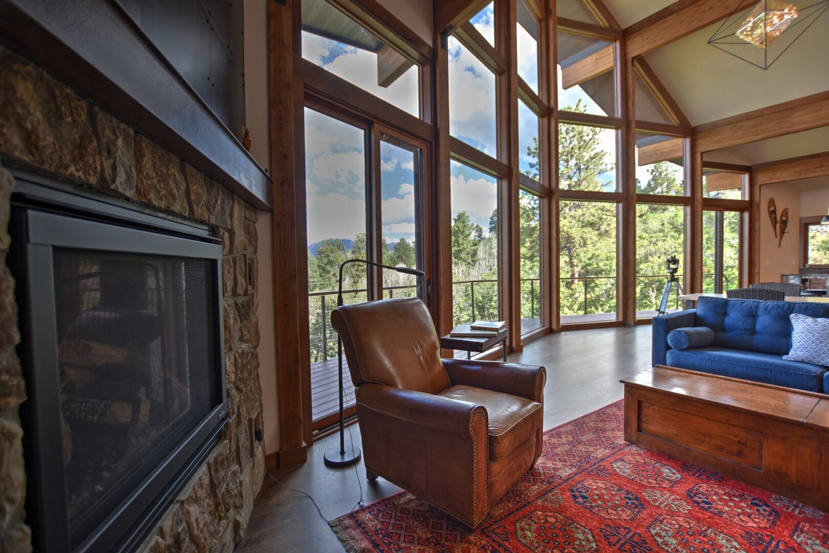 10 Valley View Road Ridgway, CO 81432 - Photo 9 of 33 a living room with furniture and a floor to ceiling window