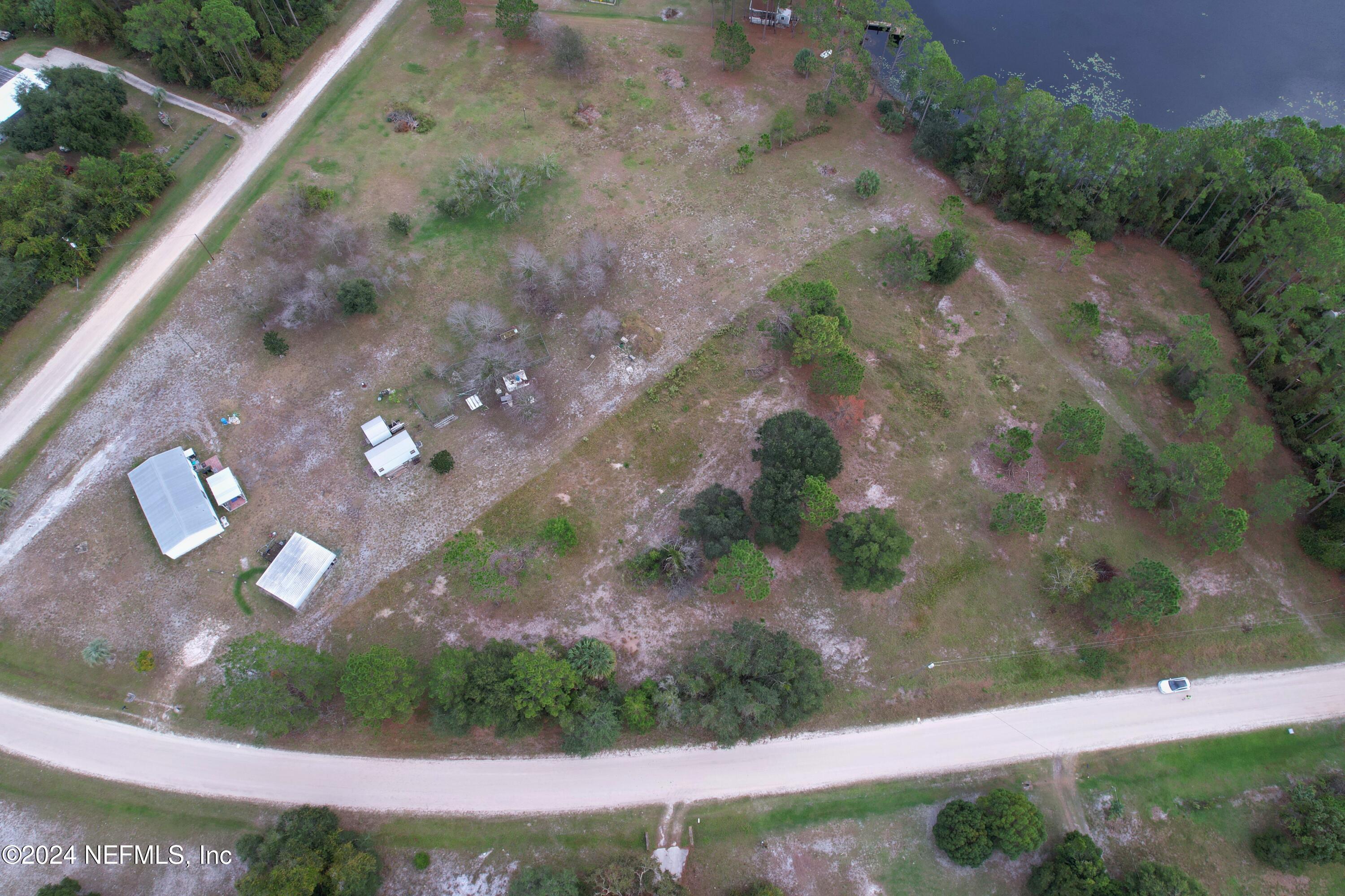 116 Osceola Road Georgetown, FL 32139 - Photo 2 of 19 a view of a yard with an outdoor space