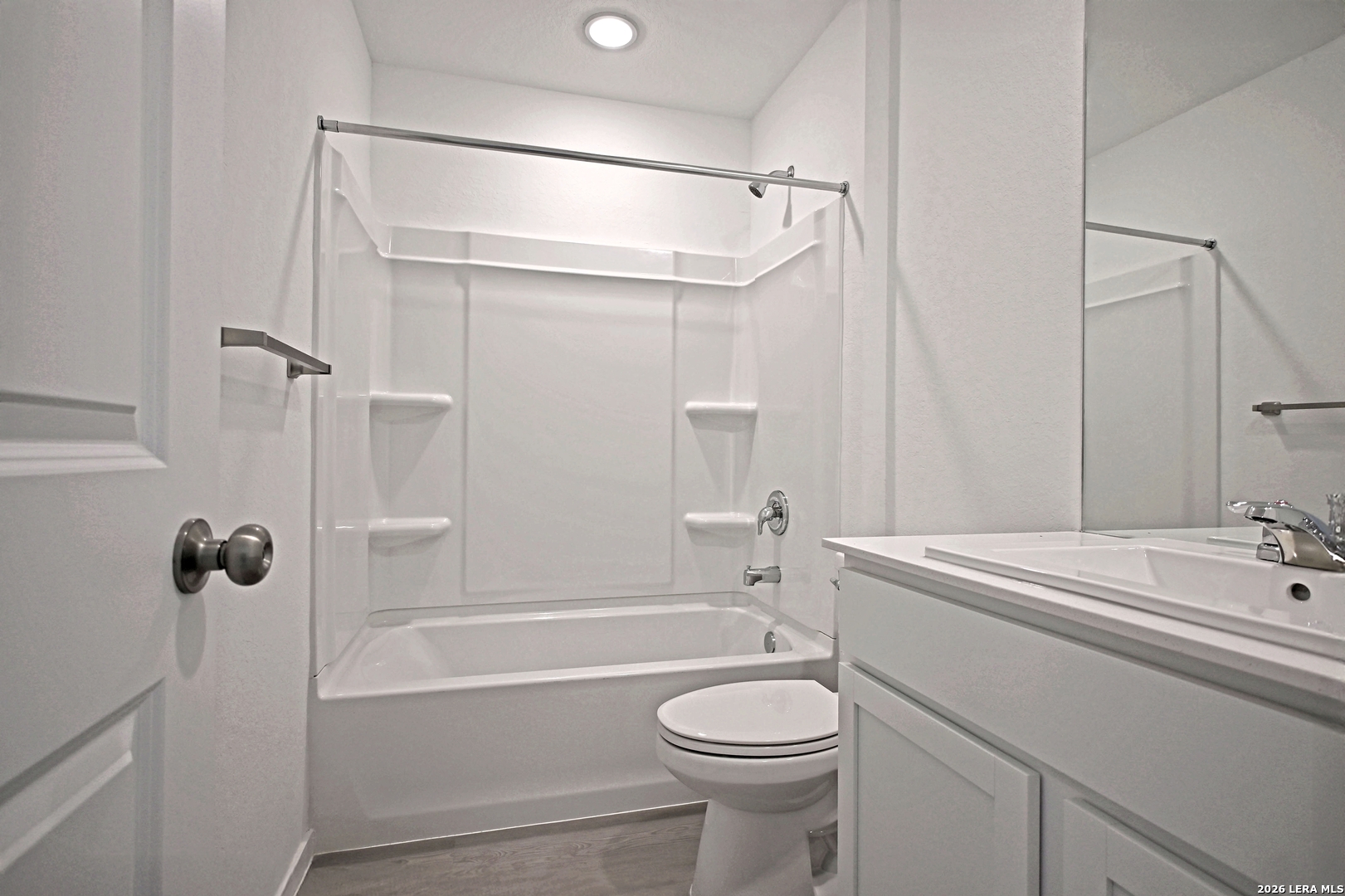 6730 Marble Ridge Elmendorf, TX 78112 - Photo 11 of 17 a bathroom with a sink a toilet and shower