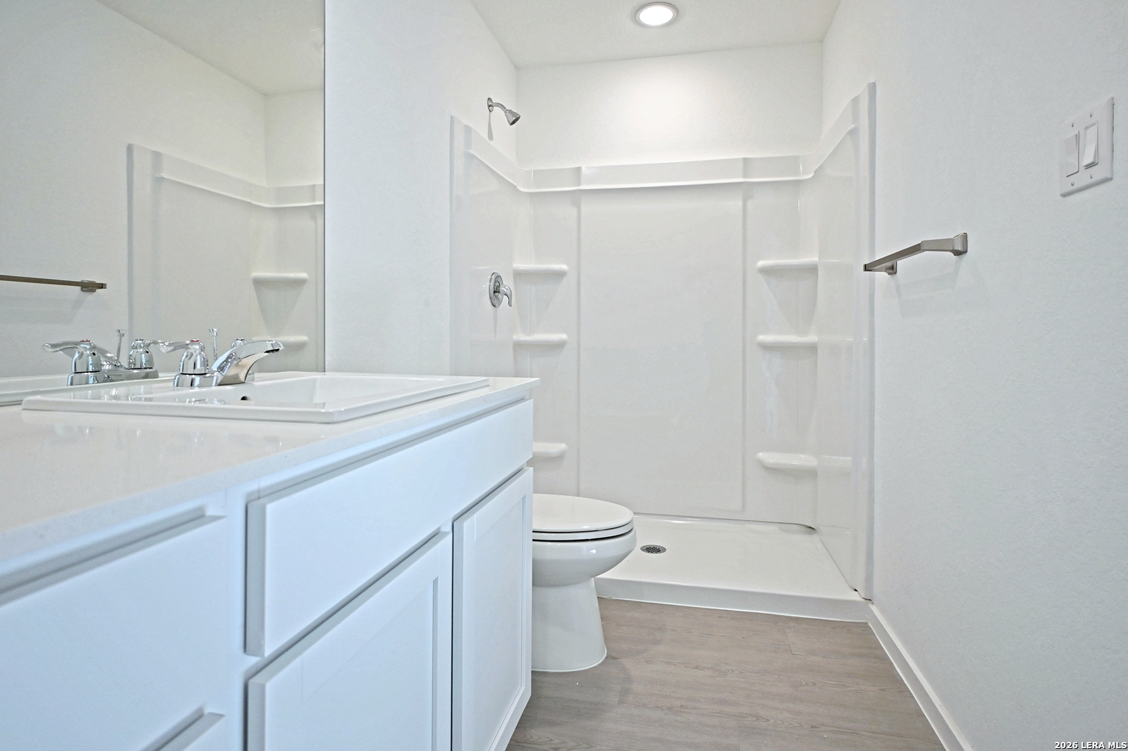 6730 Marble Ridge Elmendorf, TX 78112 - Photo 14 of 17 a bathroom with a sink a toilet and shower