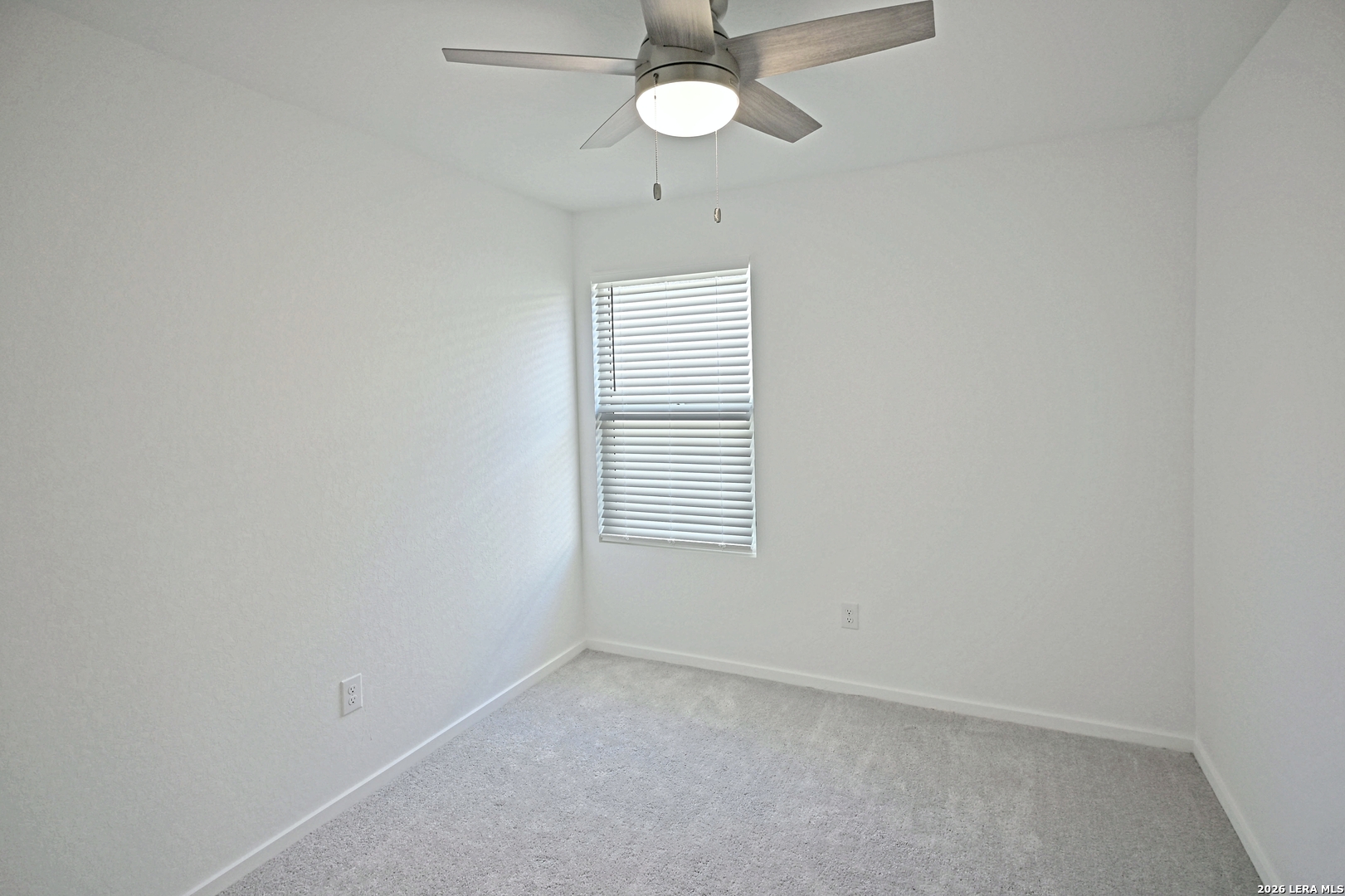 6730 Marble Ridge Elmendorf, TX 78112 - Photo 16 of 17 a view of an empty room with a window