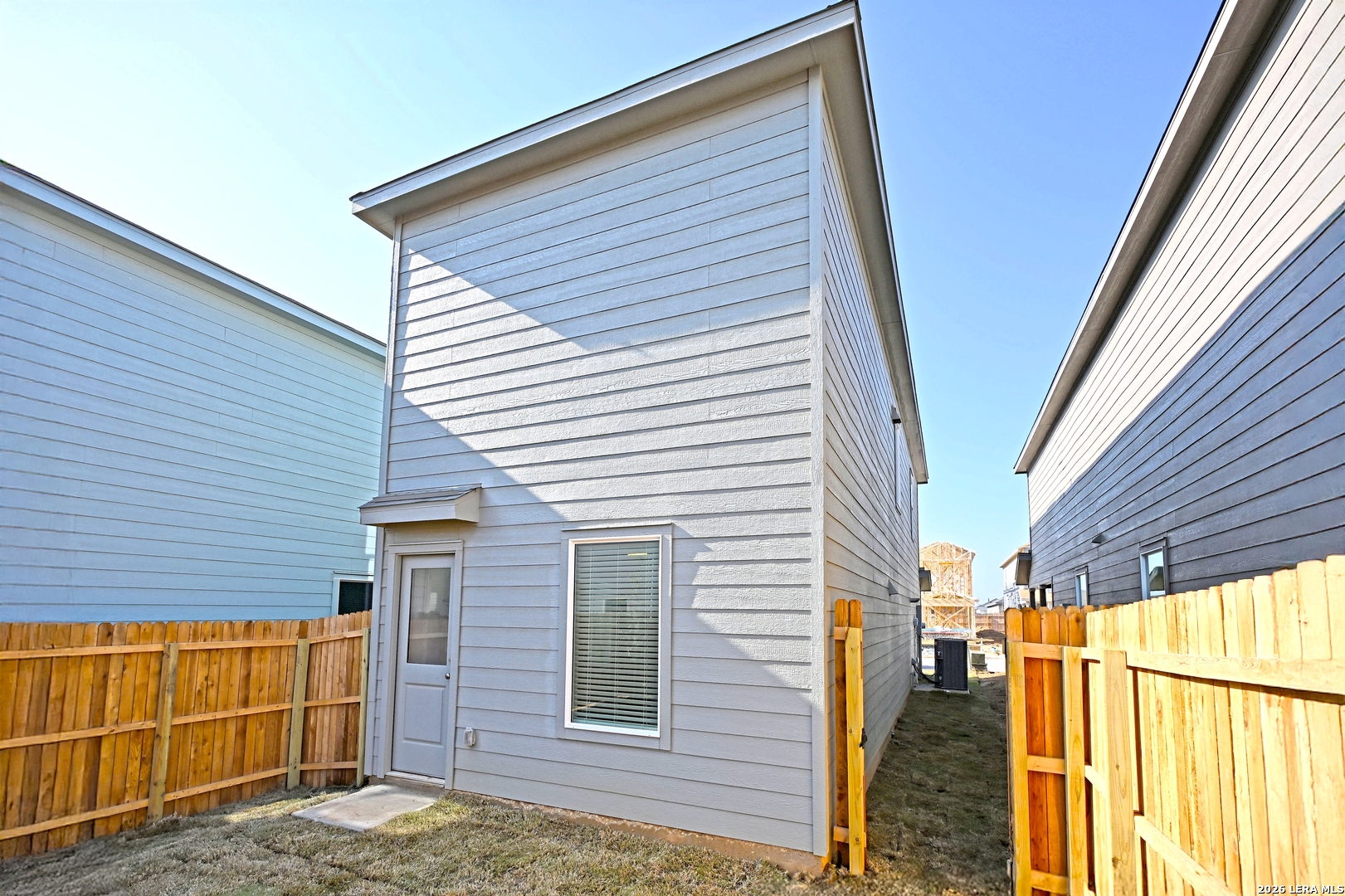 6730 Marble Ridge Elmendorf, TX 78112 - Photo 9 of 17 a view of a house with a door