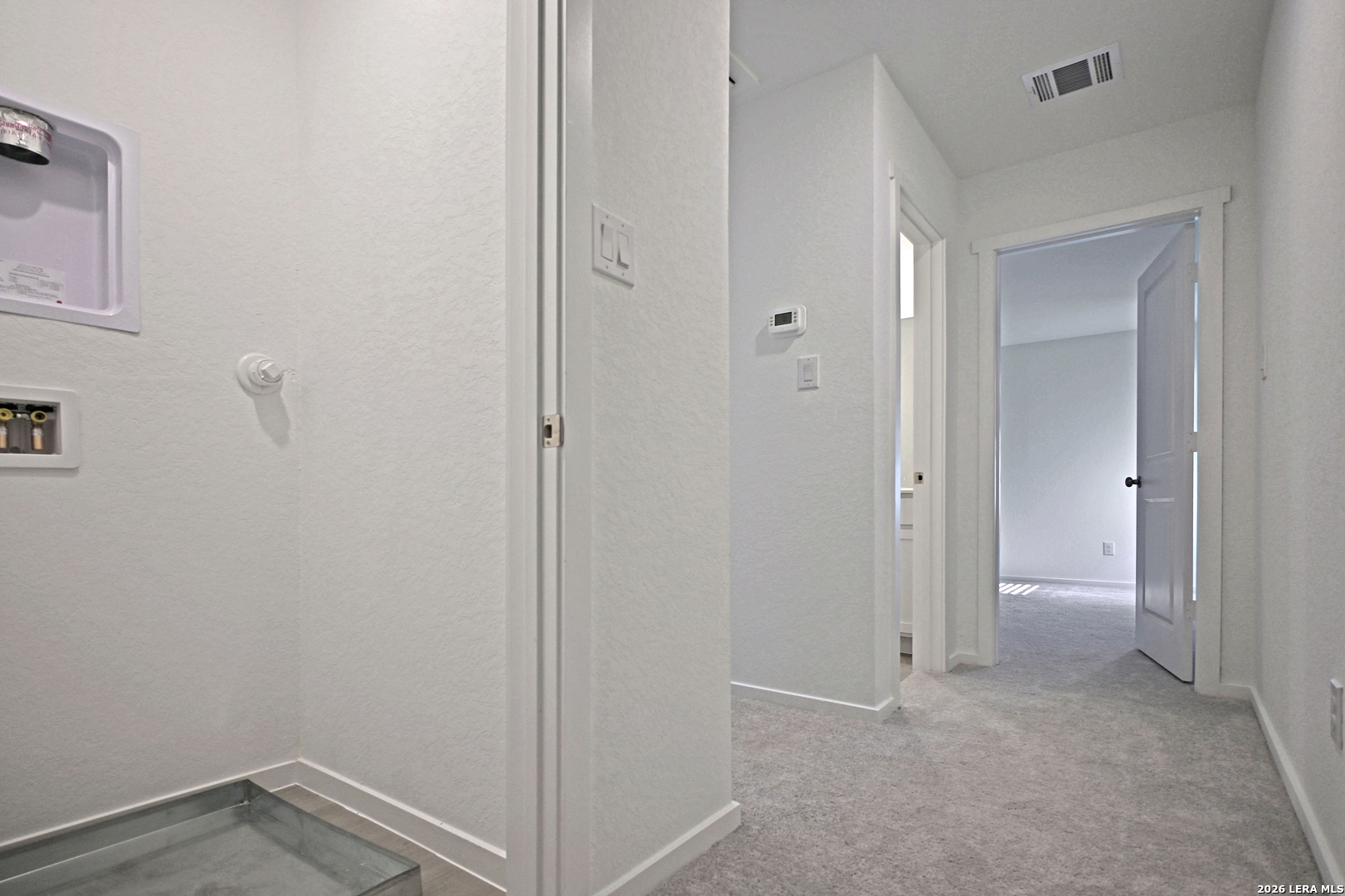 6730 Marble Ridge Elmendorf, TX 78112 - Photo 10 of 17 a view of hallway with closet