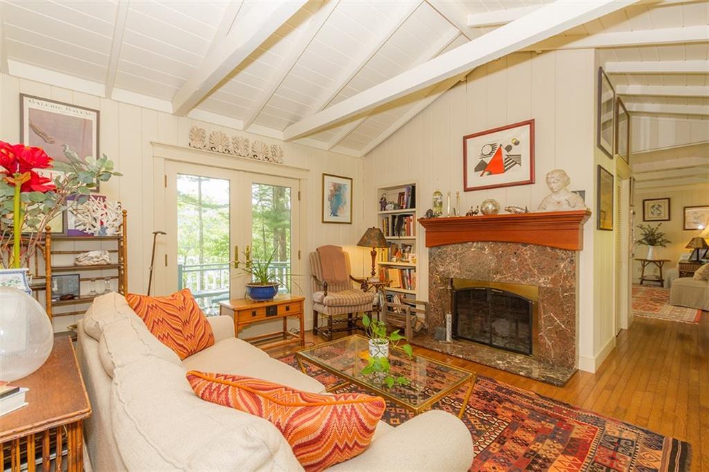 119 Shermans Point Road Camden, ME 04843 - Photo 7 of 32 Library living room with wood...