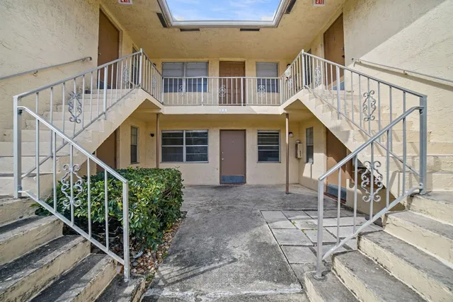 a view of front of house with stairs