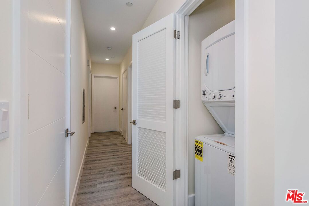 1237 South Holt Avenue, Unit 205 Los Angeles, CA 90035 - Photo 16 of 29 a bathroom with a shower and a sink