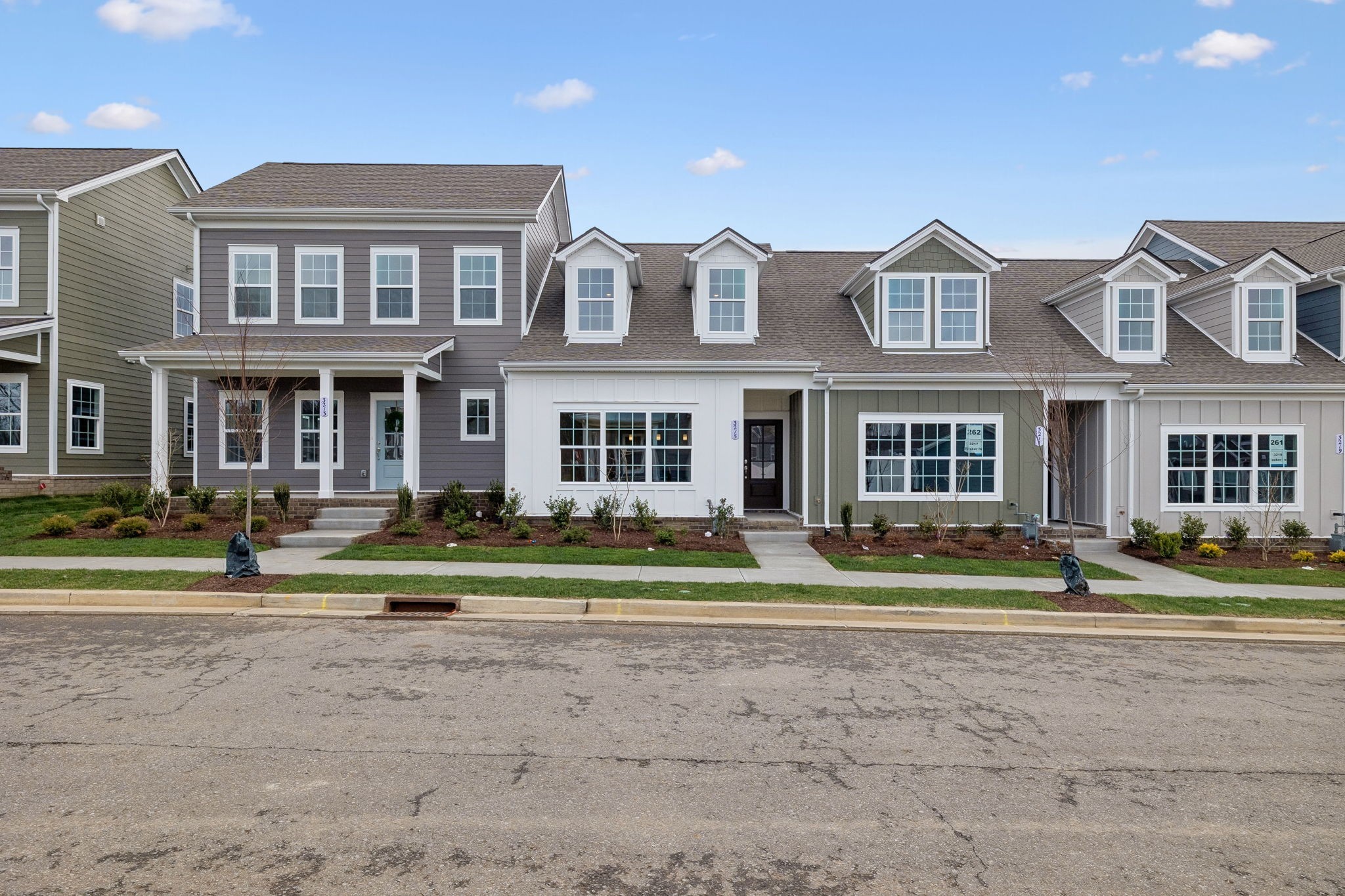 3215 Tasker Drive Antioch, TN 37013 - Photo 1 of 53 a front view of a residential apartment building with a yard