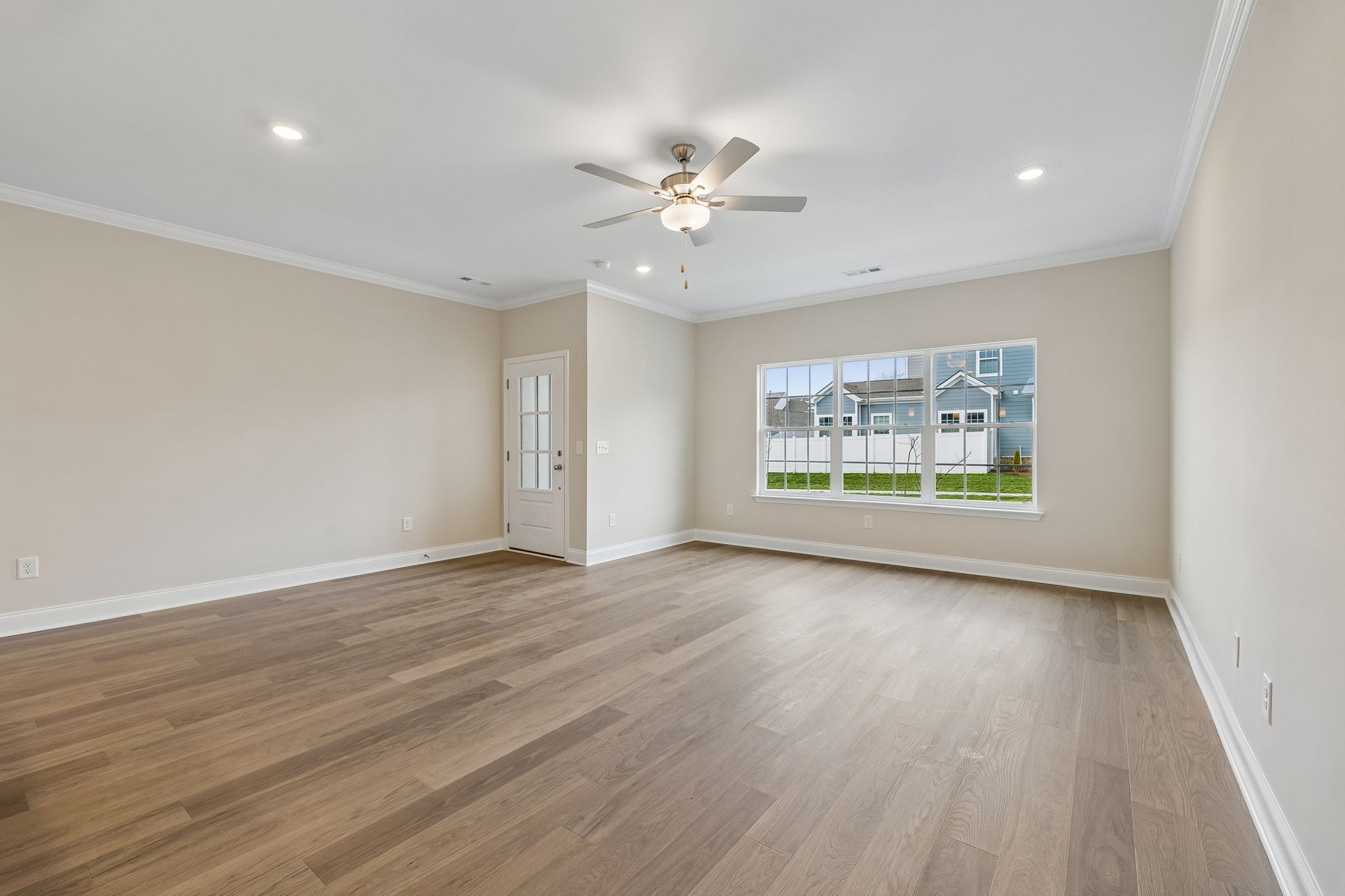 3215 Tasker Drive Antioch, TN 37013 - Photo 11 of 53 wooden floor in an empty room with a window