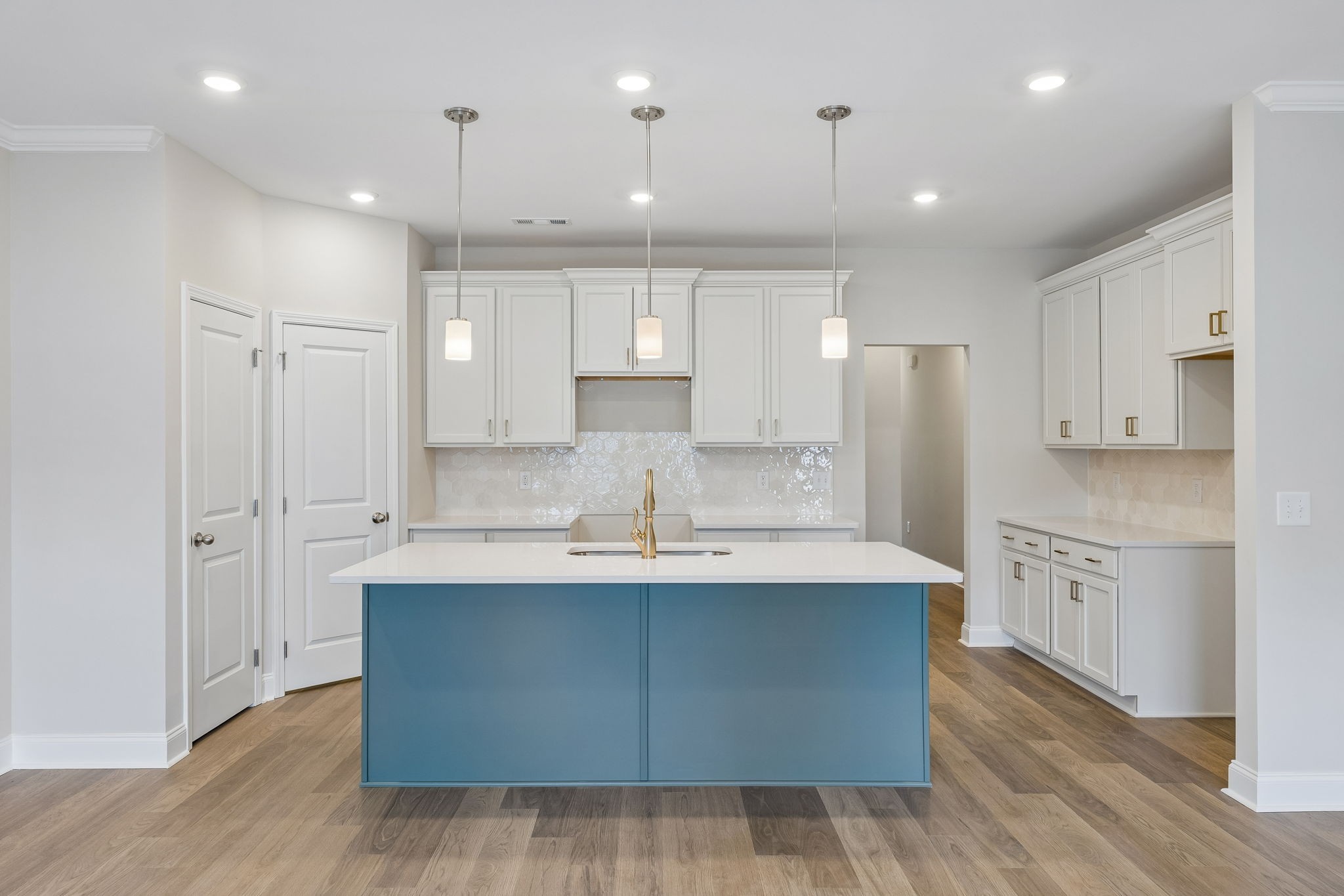 3215 Tasker Drive Antioch, TN 37013 - Photo 13 of 53 a kitchen with kitchen island a sink stainless steel appliances and cabinets