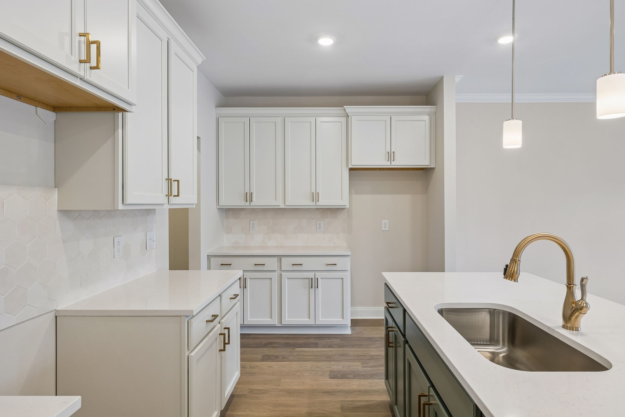 3215 Tasker Drive Antioch, TN 37013 - Photo 19 of 53 a kitchen with white cabinets sink and stove