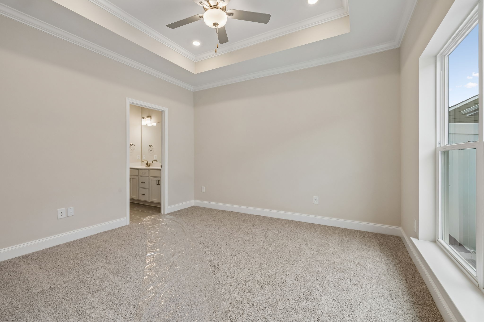 3215 Tasker Drive Antioch, TN 37013 - Photo 25 of 53 an empty room with chandelier fan and windows