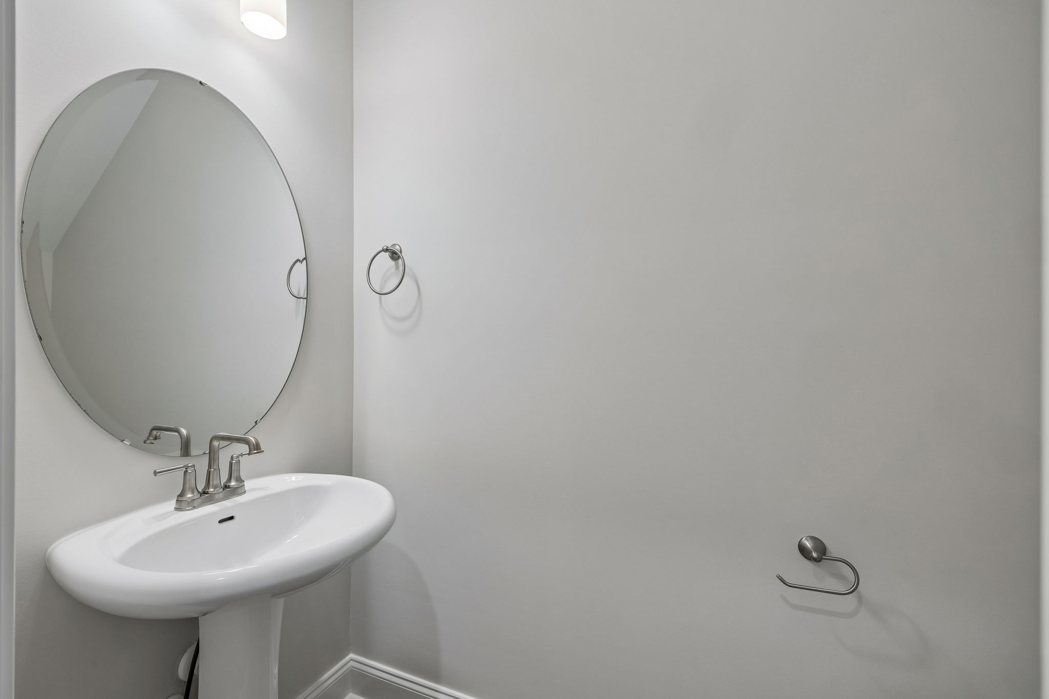 3215 Tasker Drive Antioch, TN 37013 - Photo 27 of 53 a bathroom with a sink and a mirror
