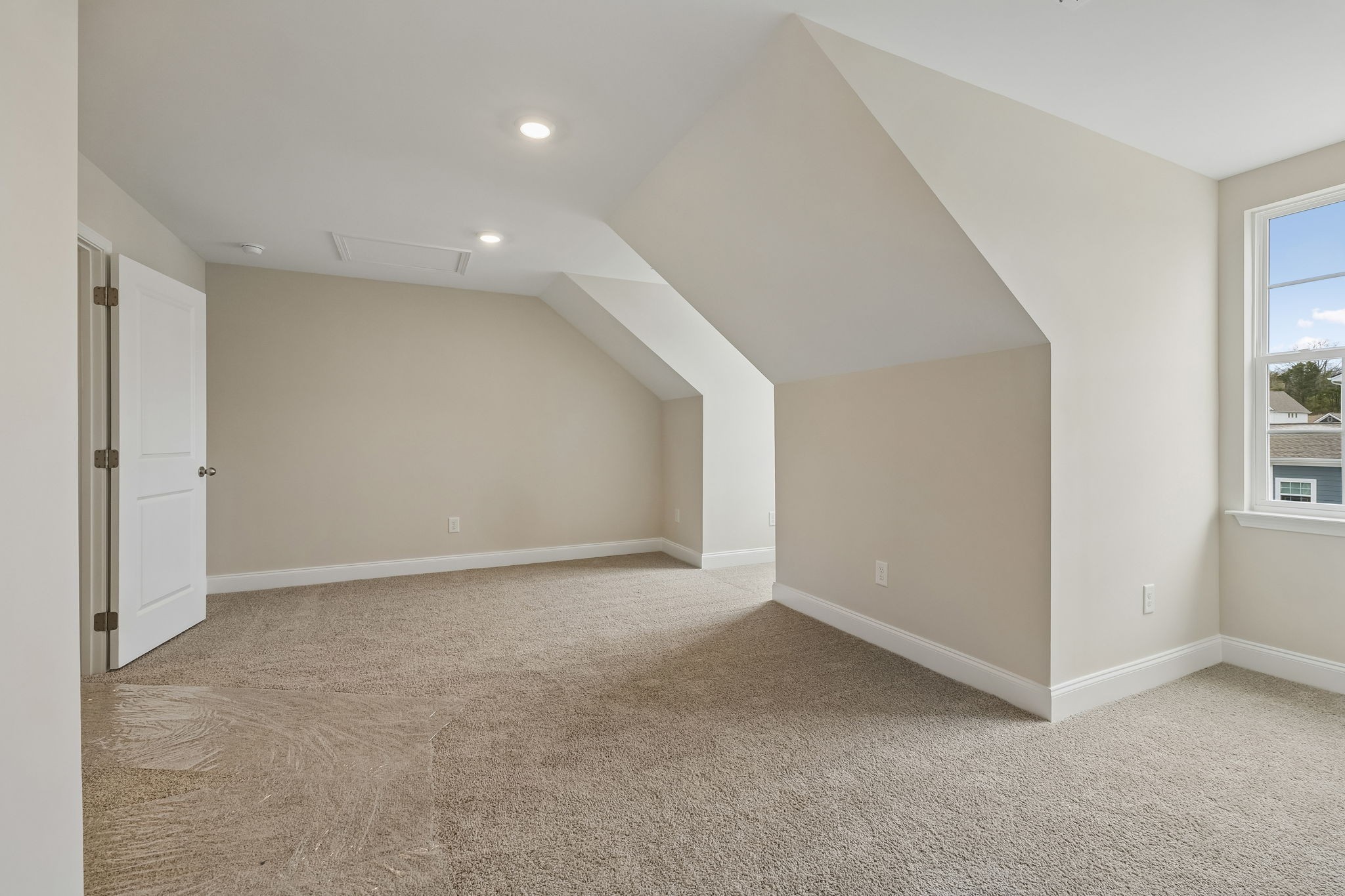 3215 Tasker Drive Antioch, TN 37013 - Photo 28 of 53 an empty room with windows and entrance to other room