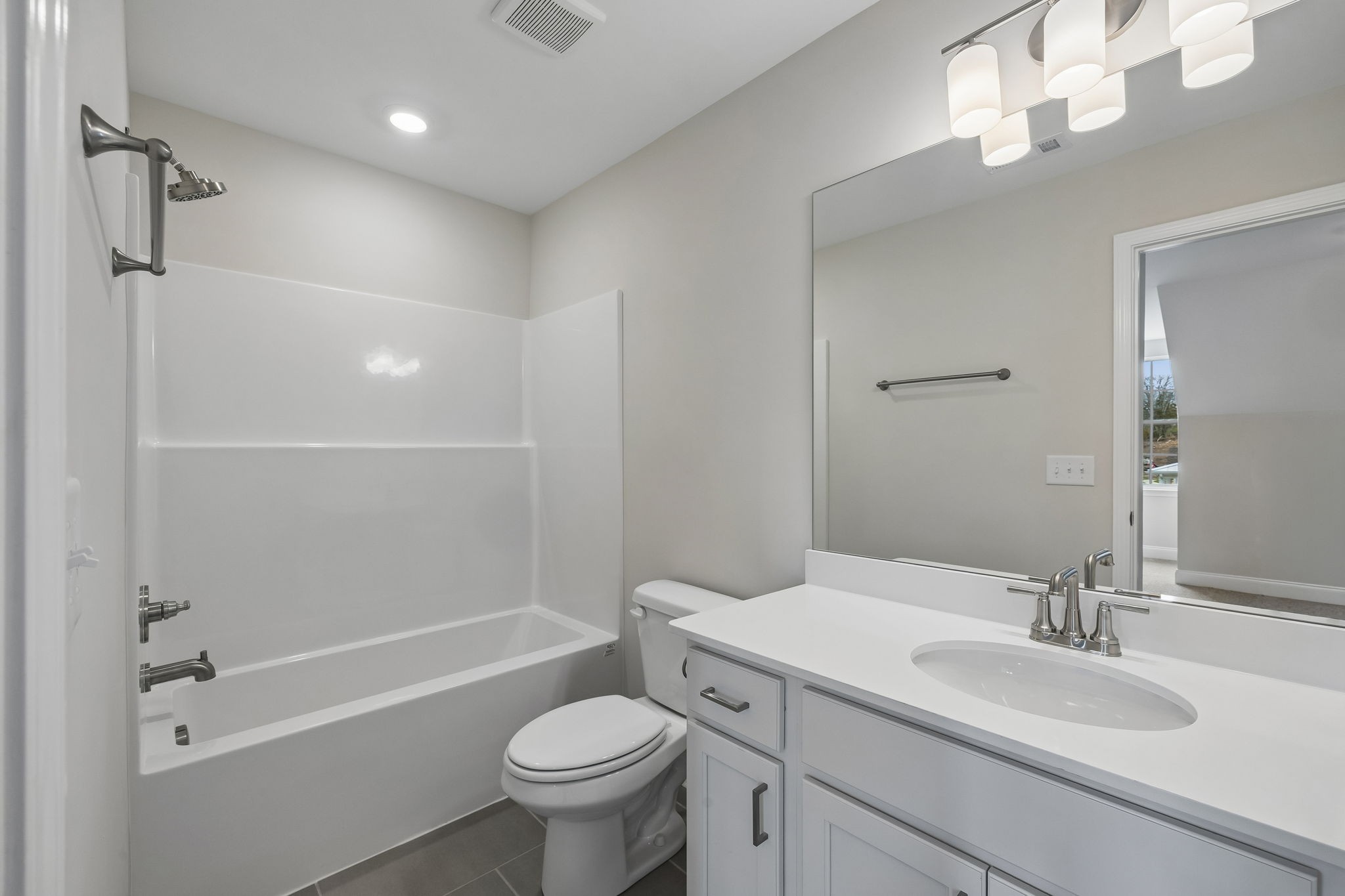 3215 Tasker Drive Antioch, TN 37013 - Photo 31 of 53 a bathroom with a sink a toilet and shower