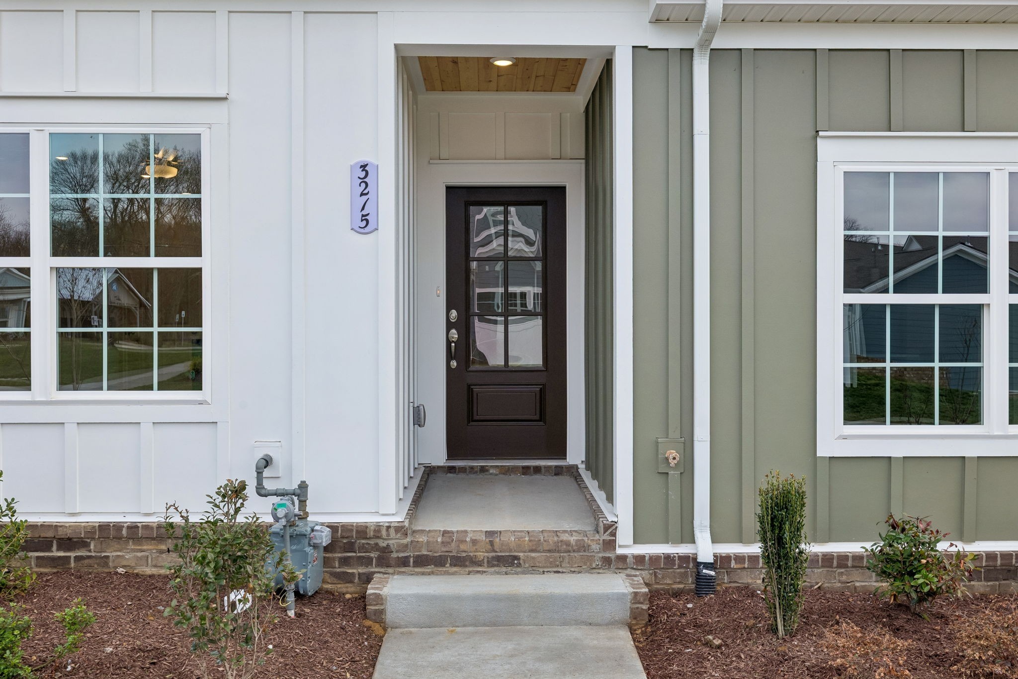 3215 Tasker Drive Antioch, TN 37013 - Photo 5 of 53 a front view of a house with a yard