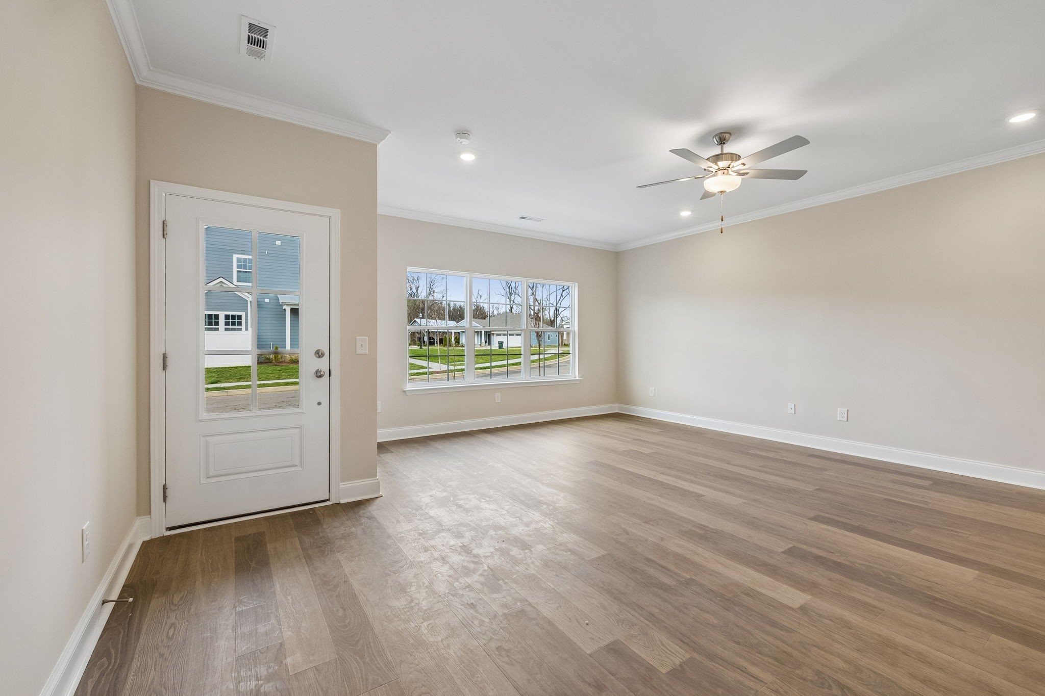 3215 Tasker Drive Antioch, TN 37013 - Photo 9 of 53 wooden floor in an empty room with a window