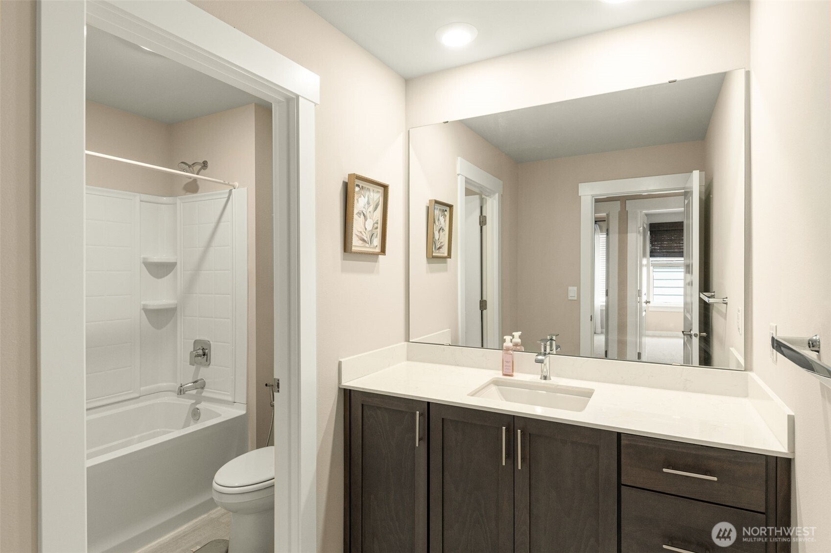 19410 28th Drive Southeast Bothell, WA 98012 - Photo 23 of 37 a bathroom with a granite countertop sink toilet and shower