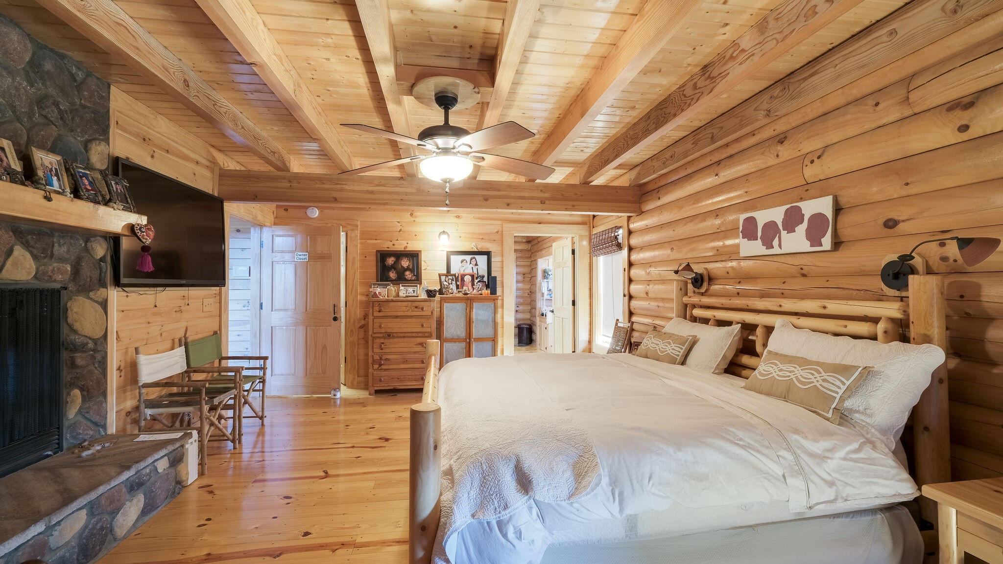 4054 Wilson Pike Franklin, TN 37067 - Photo 18 of 37 a bedroom with a bed and wooden floors