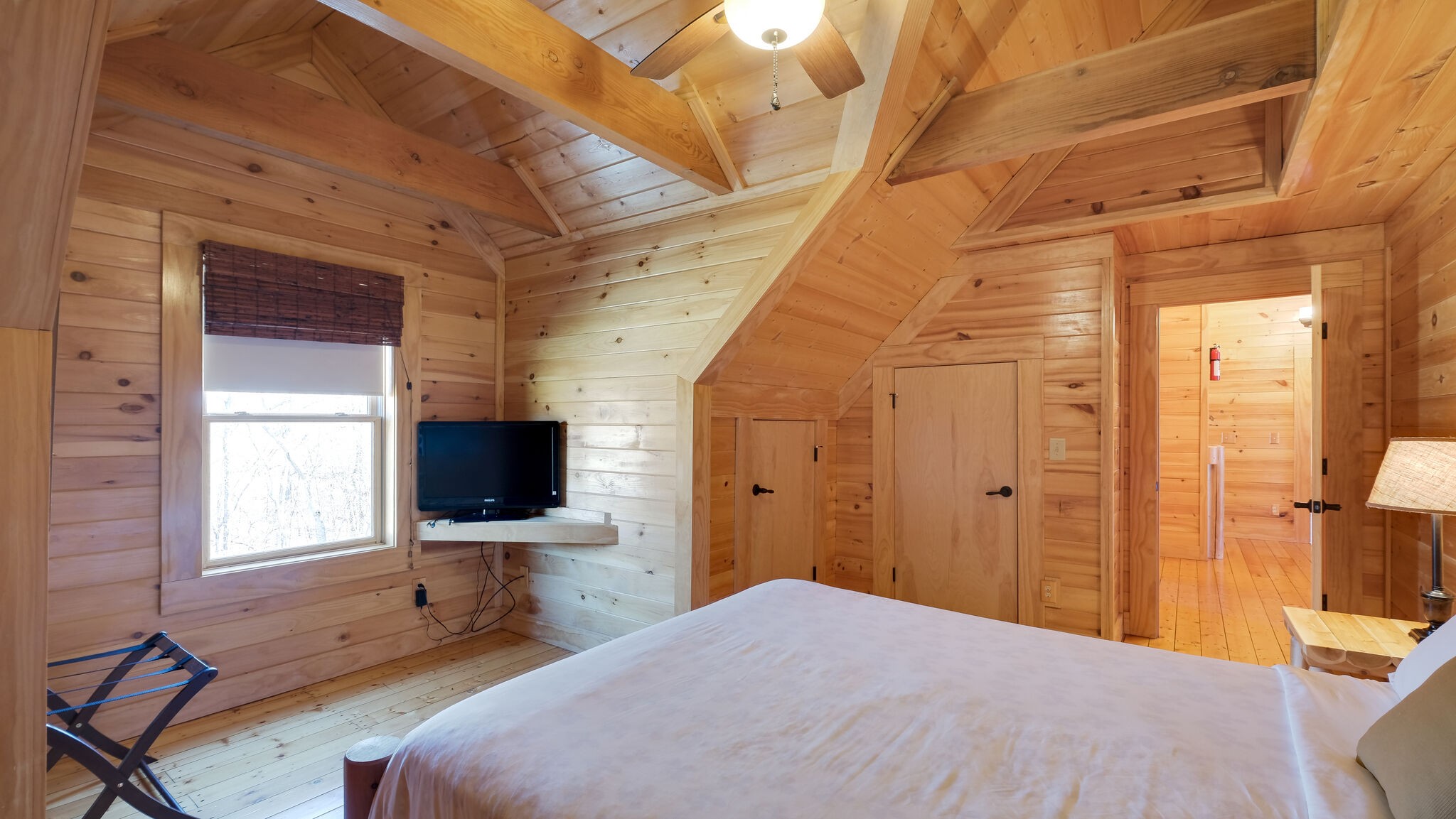 4054 Wilson Pike Franklin, TN 37067 - Photo 23 of 37 a bedroom with a bed and a flat screen tv