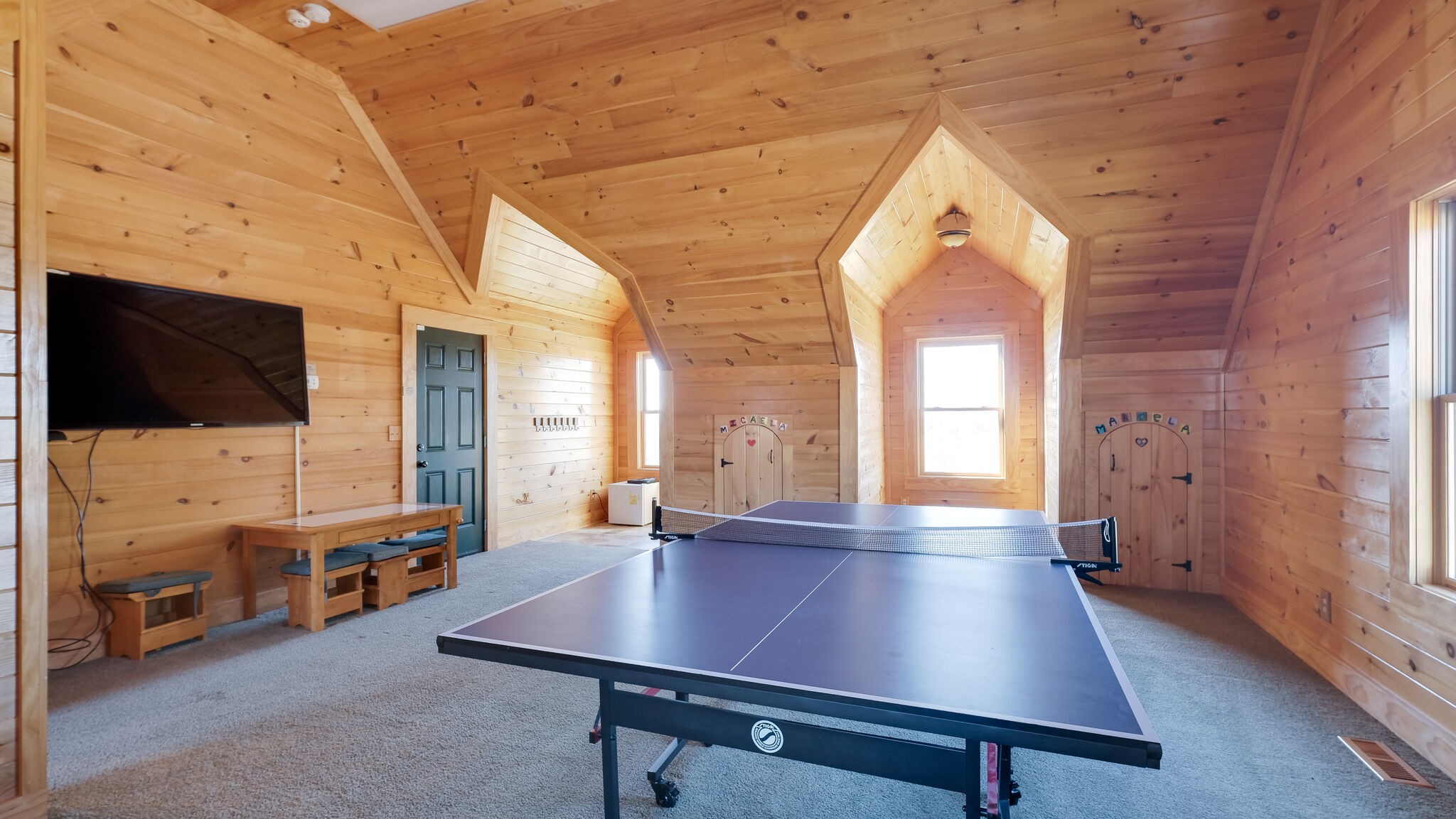 4054 Wilson Pike Franklin, TN 37067 - Photo 29 of 37 a living room with pool table flat screen tv and windows